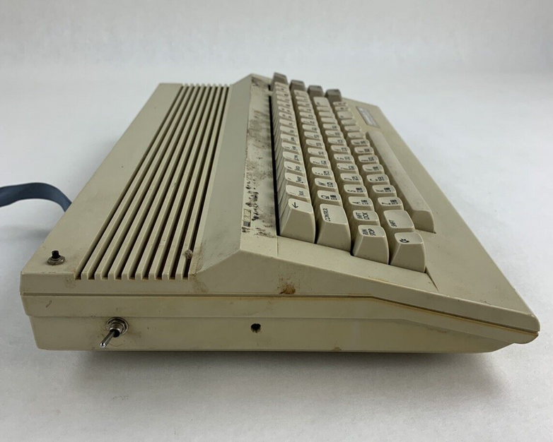 Commodore 64 64C Computer System Boots w/PSU, NKP Deluxe Keypad, and Manuals