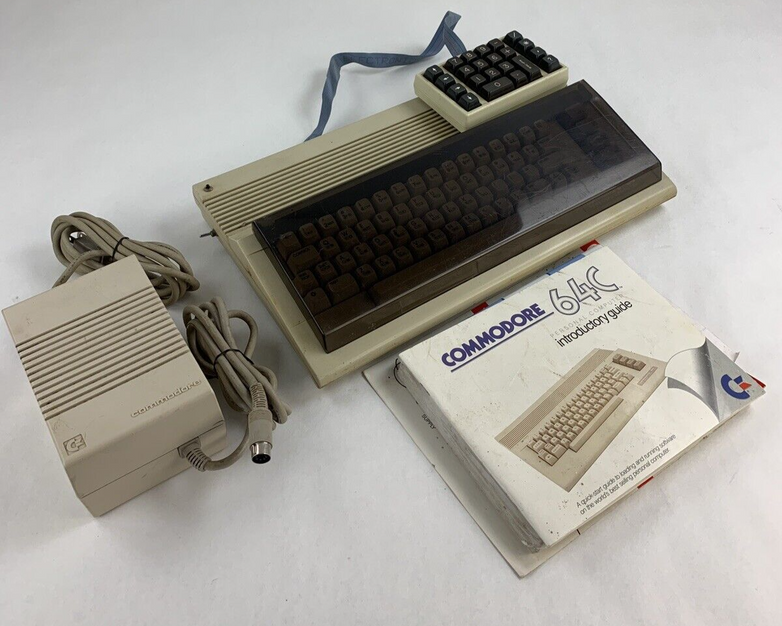 Commodore 64 64C Computer System Boots w/PSU, NKP Deluxe Keypad, and Manuals