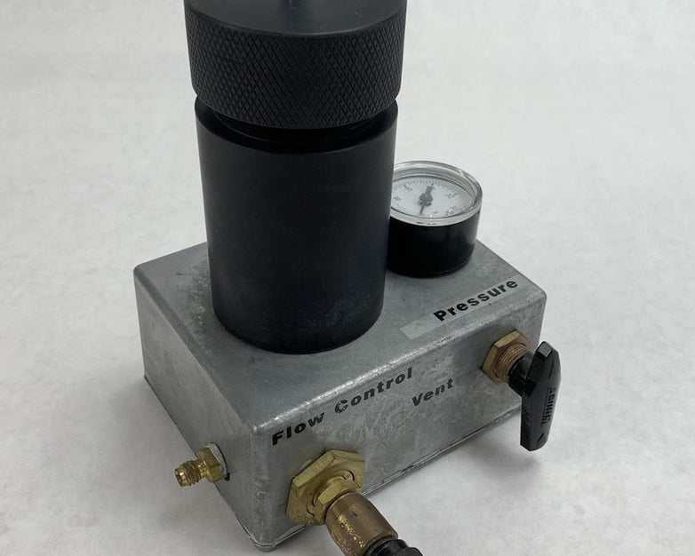 Pressure Compensated Flow Control Valve Vent With Container Vial