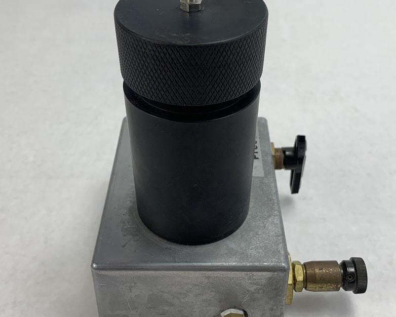 Pressure Compensated Flow Control Valve Vent With Container Vial