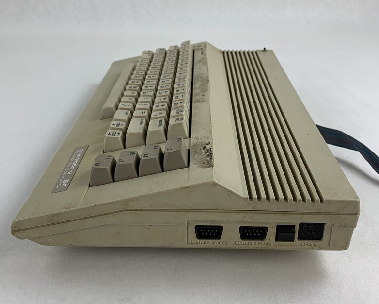 Commodore 64 64C Computer System Boots w/PSU, NKP Deluxe Keypad, and Manuals