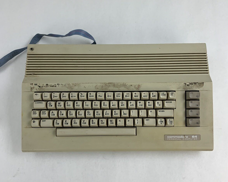 Commodore 64 64C Computer System Boots w/PSU, NKP Deluxe Keypad, and Manuals