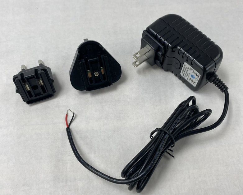 Unbranded BX18W-1201000 12V 1A AC/DC Adapter w/ International Wall Plug Adapters