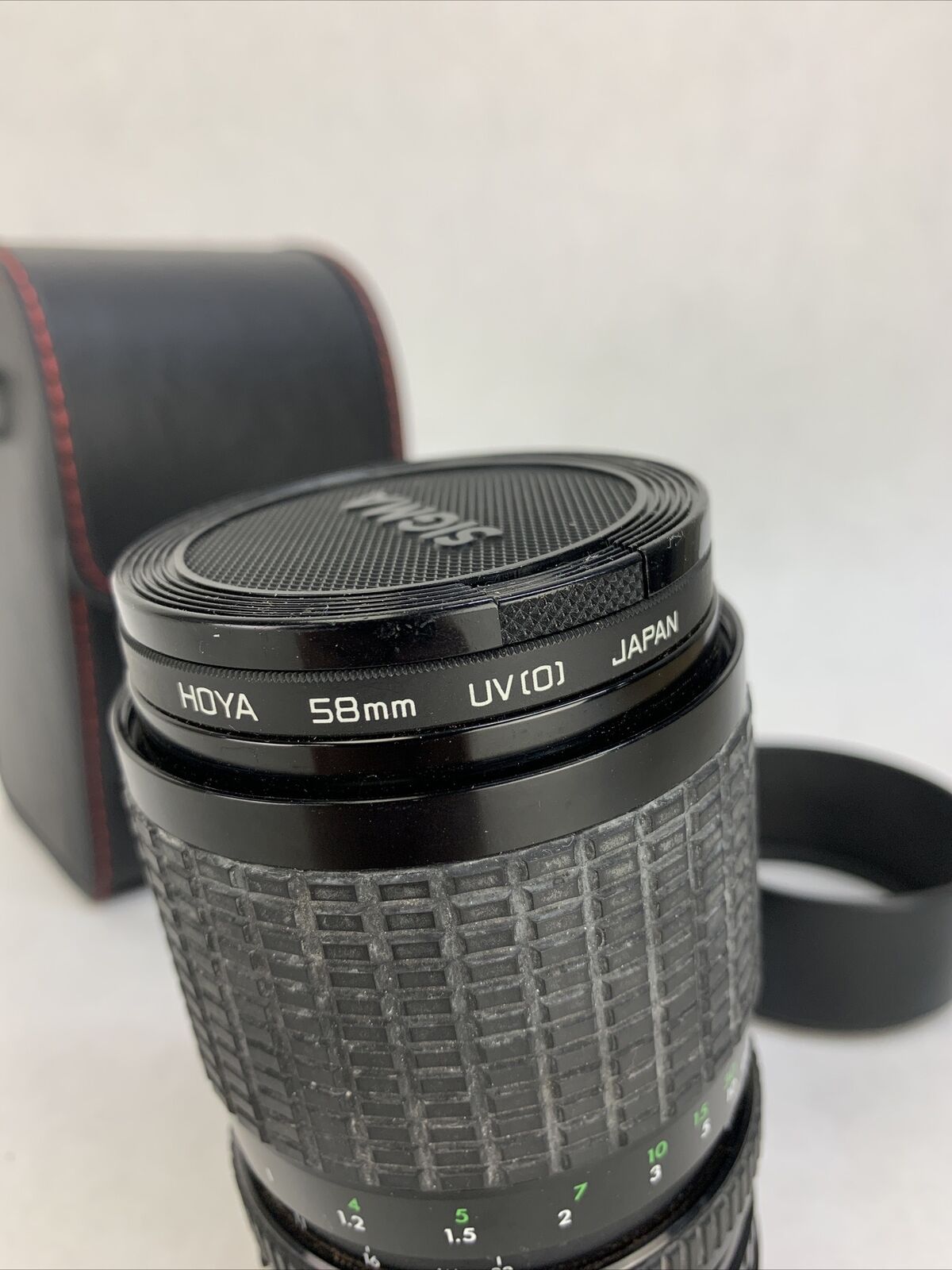 Sigma Zoom III Lens 1: 3.5- 4.5, 28 - 84 mm For Canon w/Hoya UV[0] Filter