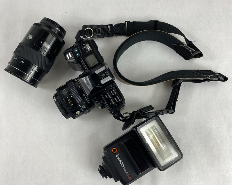 Minolta Maxxum 7000 AF SLR 35mm Film Camera With Extra Lens and Flash Attachment