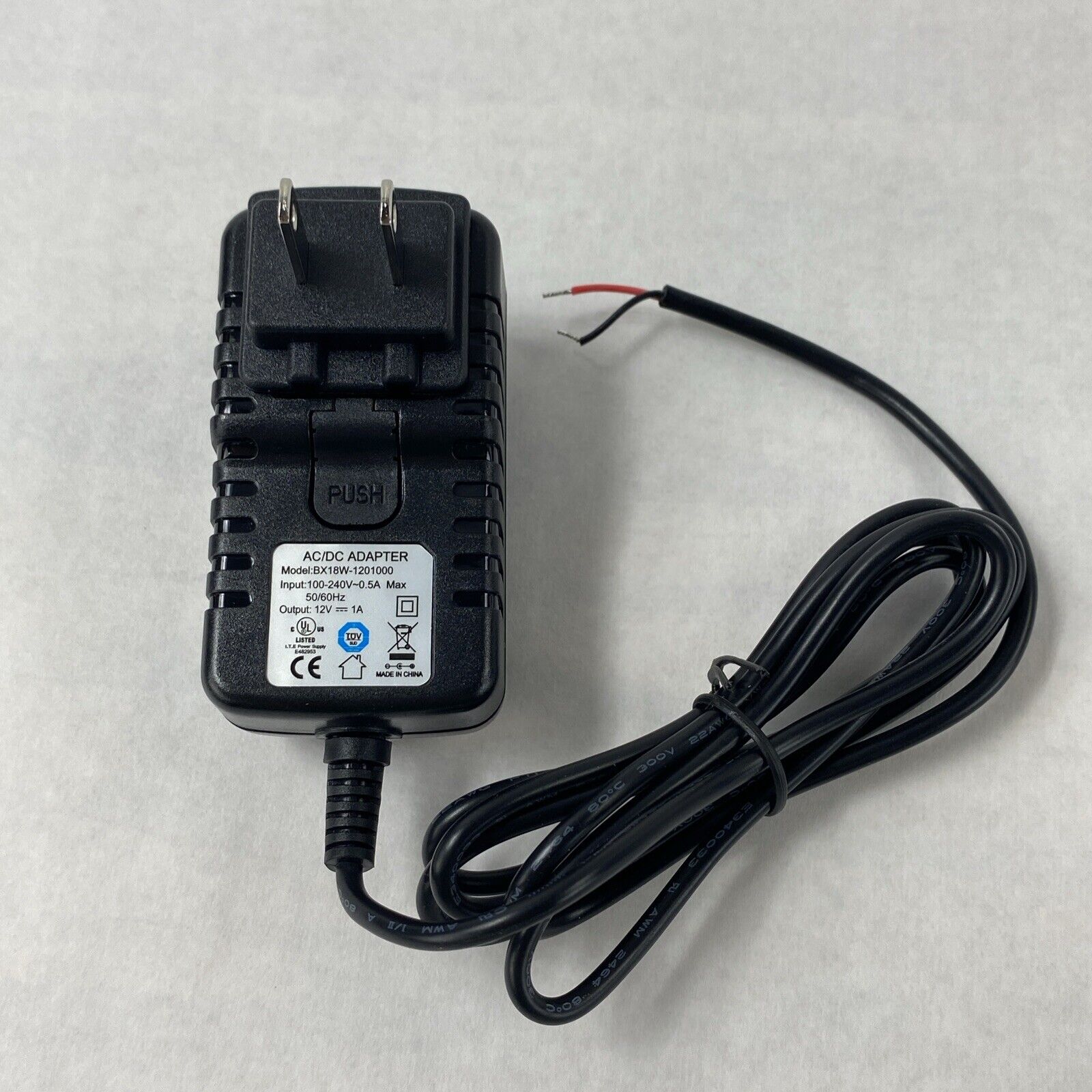 Unbranded BX18W-1201000 12V 1A AC/DC Adapter w/ International Wall Plug Adapters