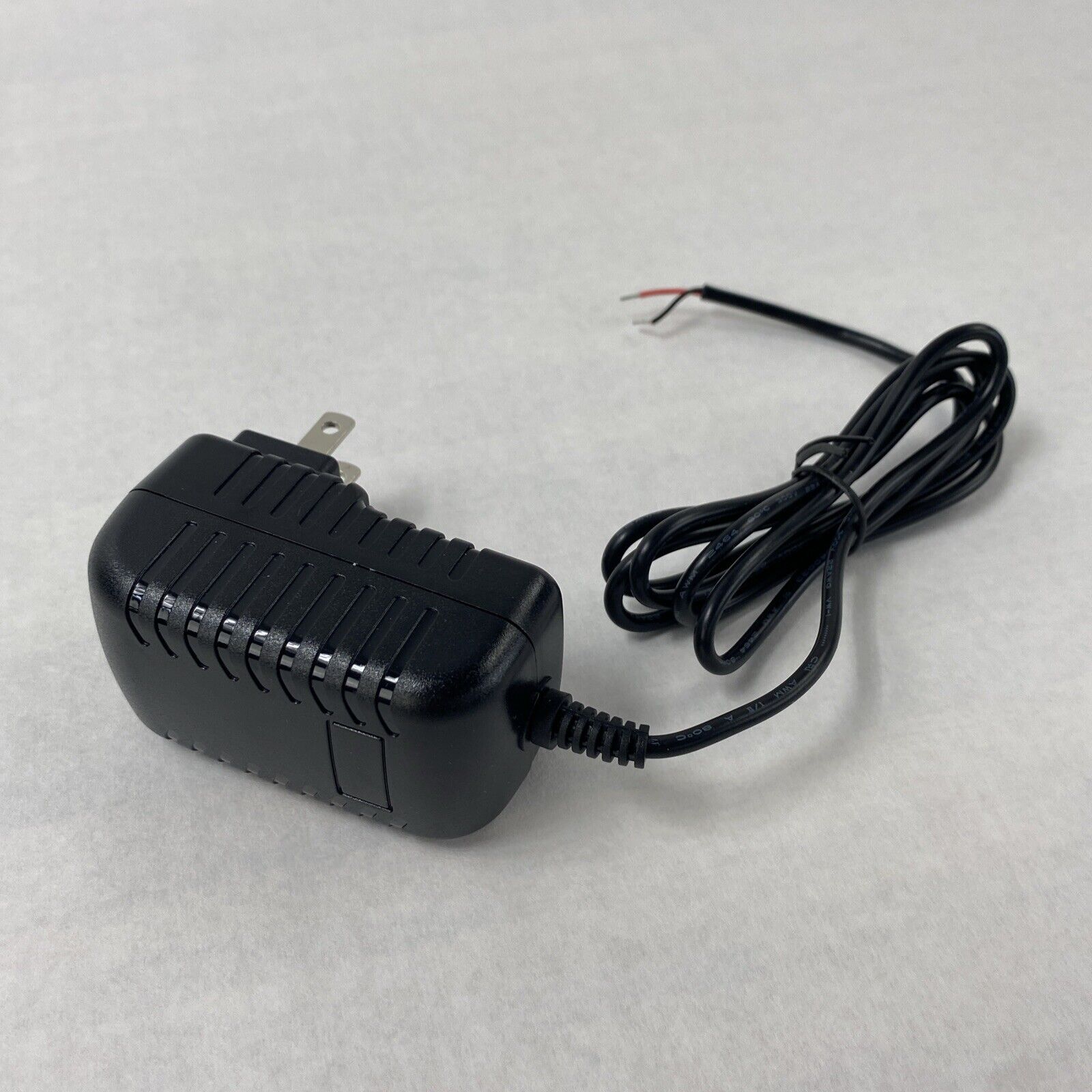 Unbranded BX18W-1201000 12V 1A AC/DC Adapter w/ International Wall Plug Adapters