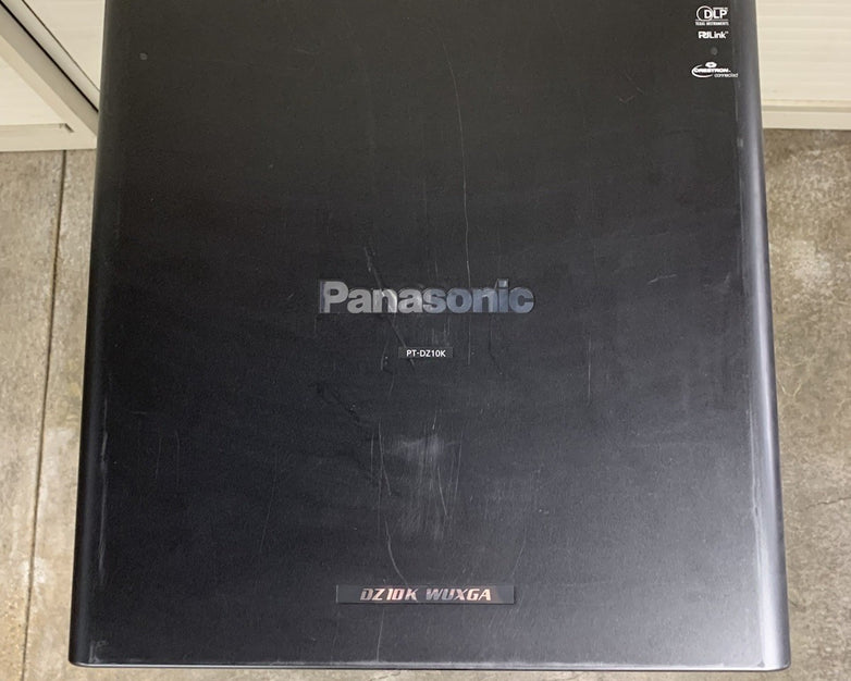 Panasonic PT-DZ10KU WUXGA DLP Lamp Projector - Tested No Lens No Remote