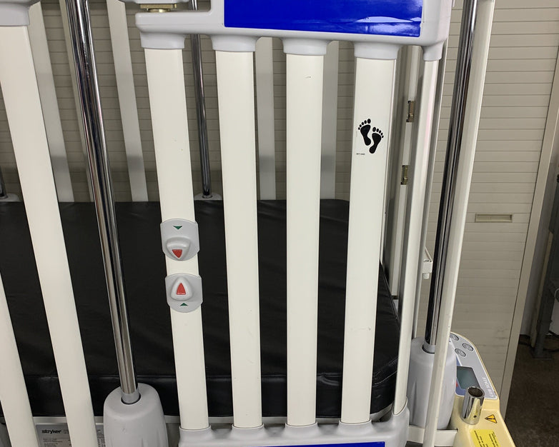 Stryker Cub FL19H Pediatric Crib with Mattress No Handles on Doors
