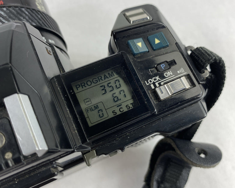 Minolta Maxxum 7000 AF SLR 35mm Film Camera With Extra Lens and Flash Attachment