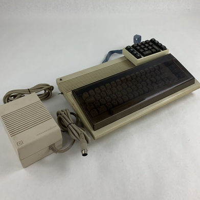 Commodore 64 64C Computer System Boots w/PSU, NKP Deluxe Keypad, and Manuals