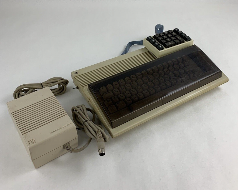 Commodore 64 64C Computer System Boots w/PSU, NKP Deluxe Keypad, and Manuals