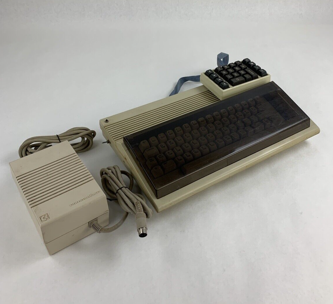 Commodore 64 64C Computer System Boots w/PSU, NKP Deluxe Keypad, and Manuals