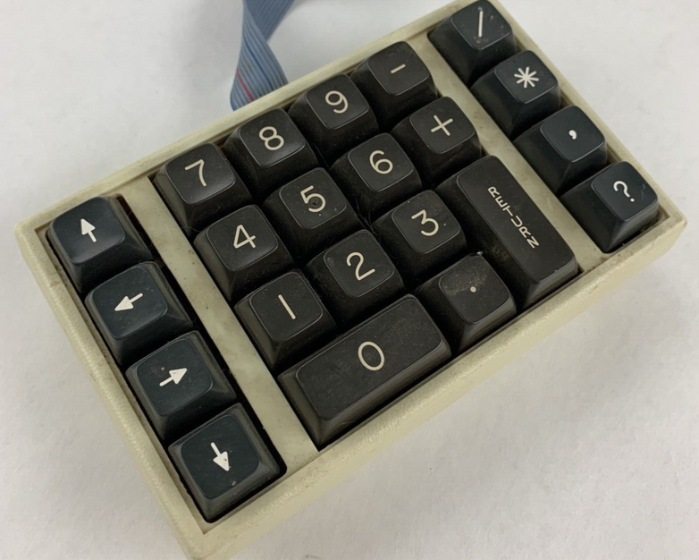Commodore 64 64C Computer System Boots w/PSU, NKP Deluxe Keypad, and Manuals