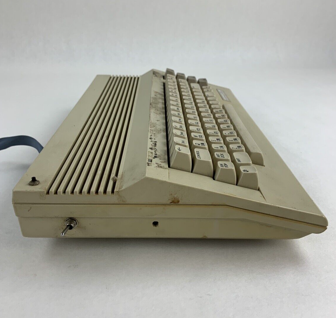 Commodore 64 64C Computer System Boots w/PSU, NKP Deluxe Keypad, and Manuals