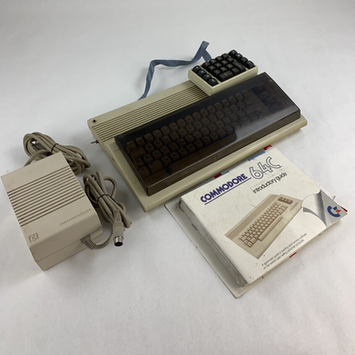 Commodore 64 64C Computer System Boots w/PSU, NKP Deluxe Keypad, and Manuals