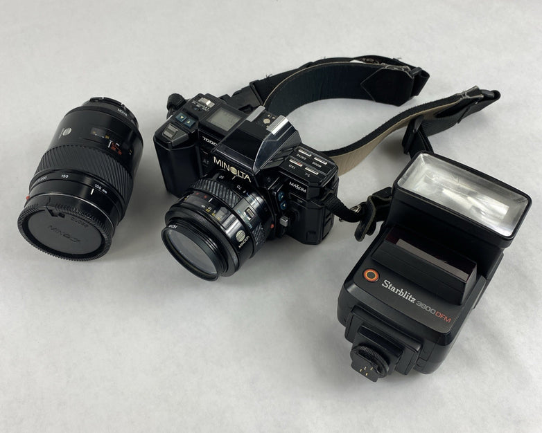 Minolta Maxxum 7000 AF SLR 35mm Film Camera With Extra Lens and Flash Attachment