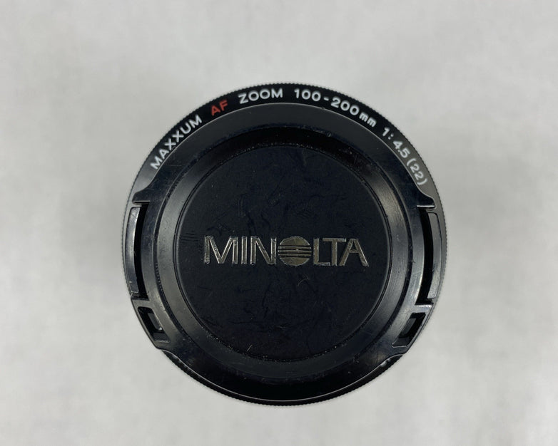 Minolta Maxxum 7000 AF SLR 35mm Film Camera With Extra Lens and Flash Attachment