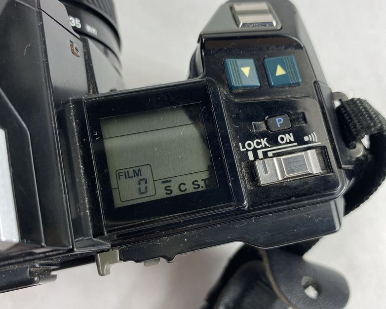Minolta Maxxum 7000 AF SLR 35mm Film Camera With Extra Lens and Flash Attachment