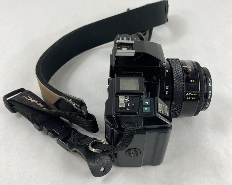 Minolta Maxxum 7000 AF SLR 35mm Film Camera With Extra Lens and Flash Attachment