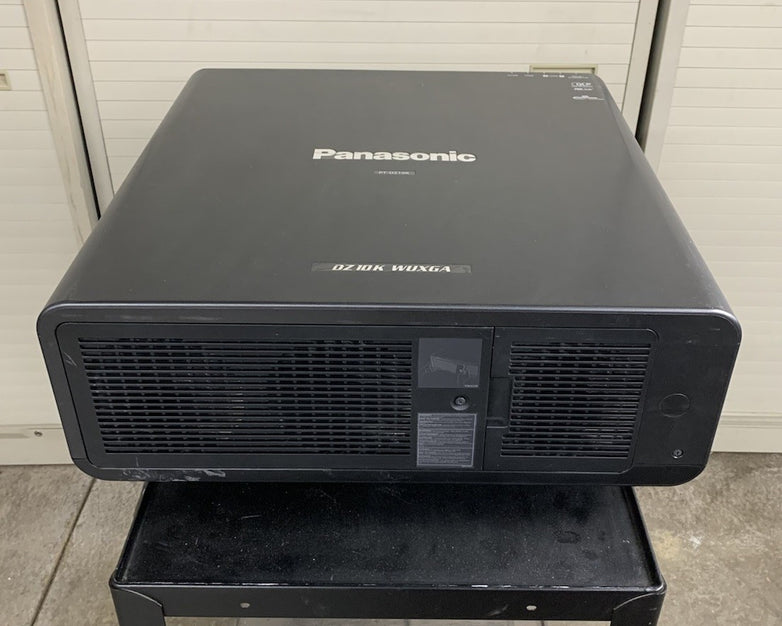 Panasonic PT-DZ10KU WUXGA DLP Lamp Projector 3077 H - Tested No Lens No Remote