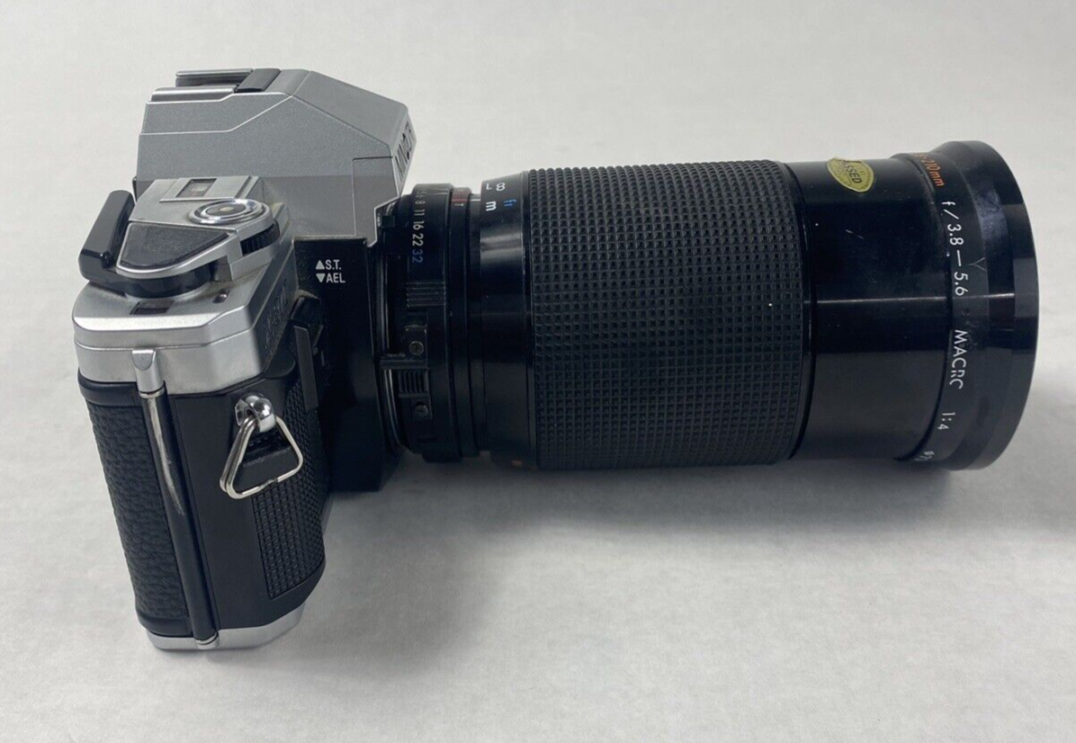 Minolta X-370 35mm SLR Camera with Kiron Macro Lens 28-210mm f/3.8-5.6 Untested