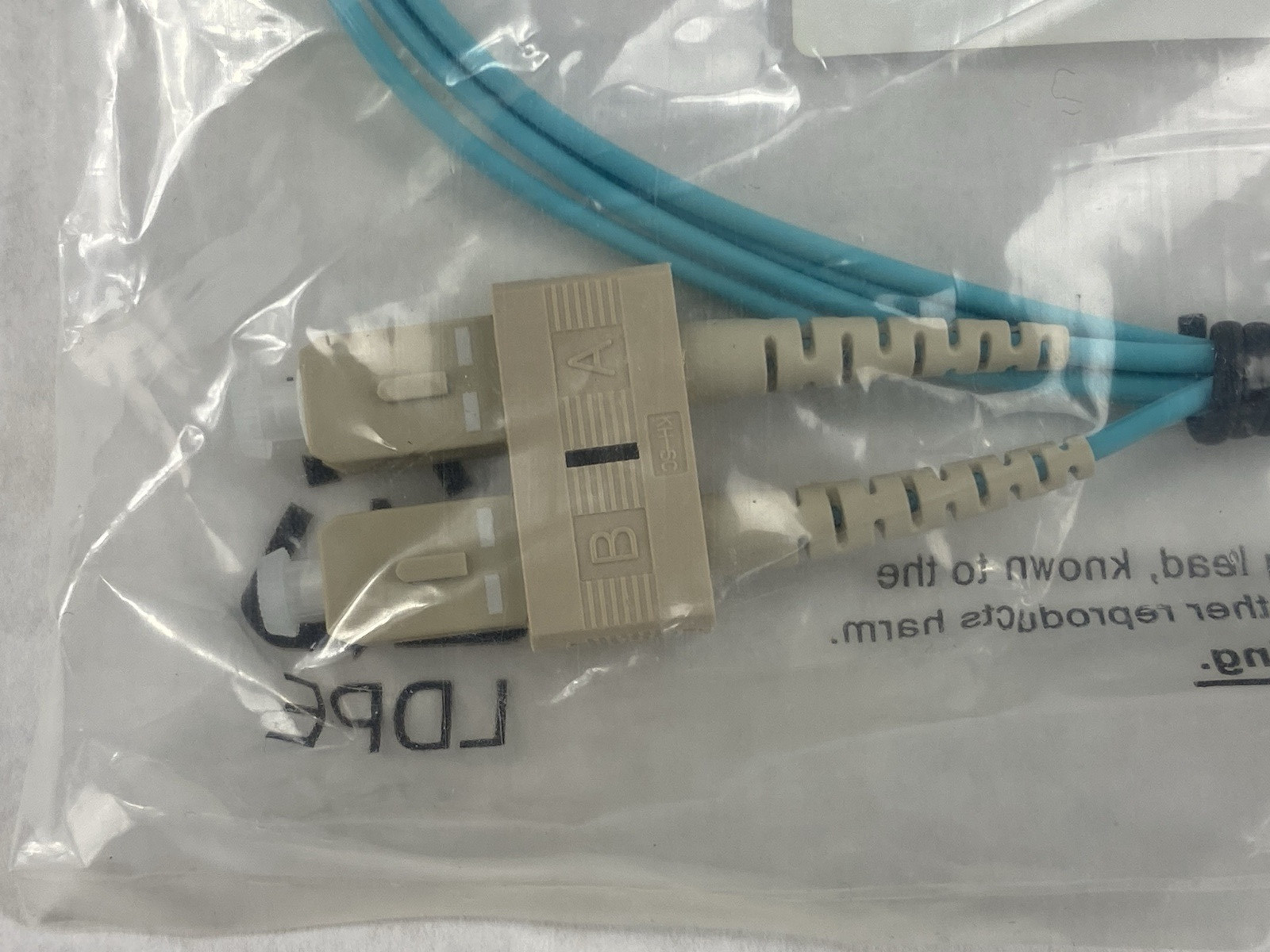Belkin F2F402L7-01M-G  LC to SC 1M LO Multimode Aqua 10Gb Fiber Optic Cable