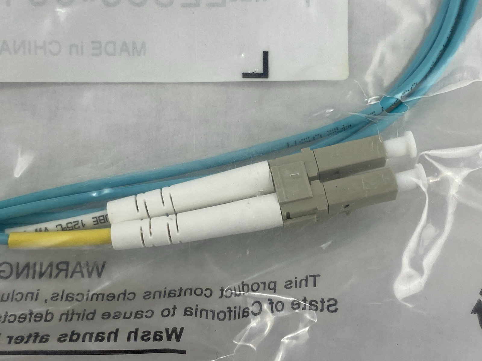 Belkin F2F402L7-01M-G  LC to SC 1M LO Multimode Aqua 10Gb Fiber Optic Cable