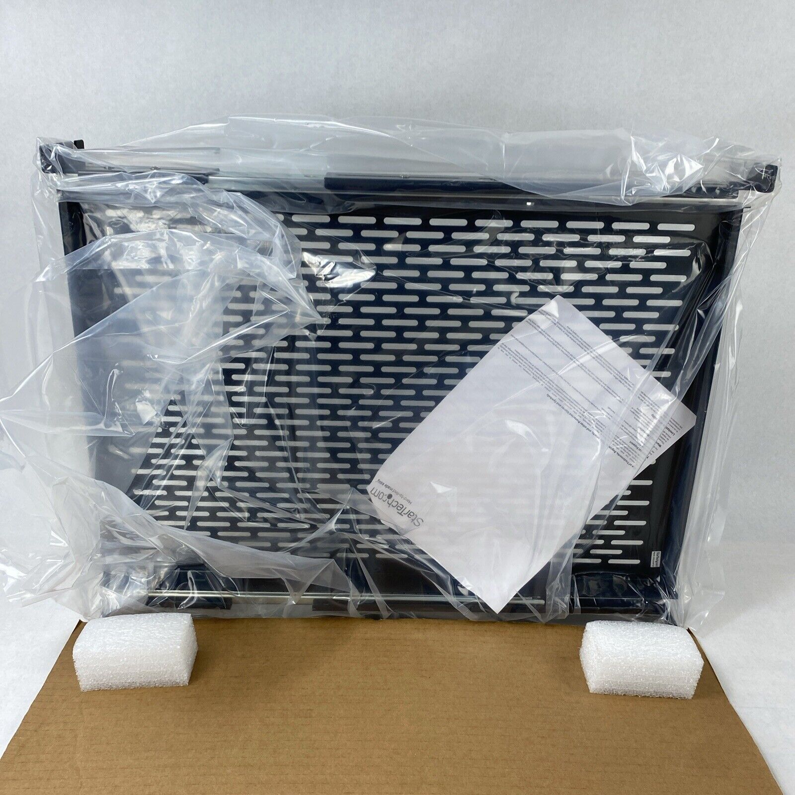 StarTech UNISLDSHF19 2U Adjustable Depth Vented Sliding Rack Mount Shelf