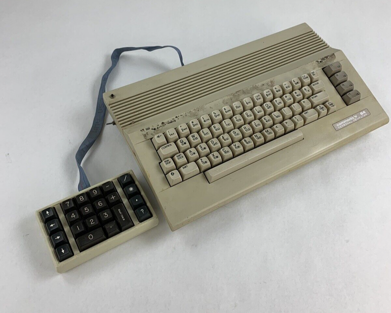 Commodore 64 64C Computer System Boots w/PSU, NKP Deluxe Keypad, and Manuals