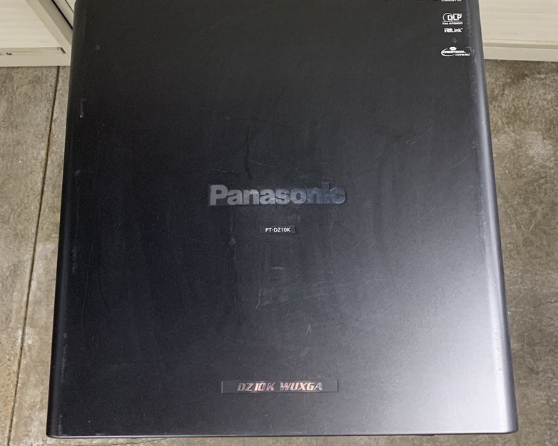 Panasonic PT-DZ10KU WUXGA DLP Lamp Projector 172 H - Tested No Lens No Remote