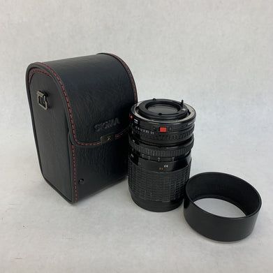 Sigma Zoom III Lens 1: 3.5- 4.5, 28 - 84 mm For Canon w/Hoya UV[0] Filter