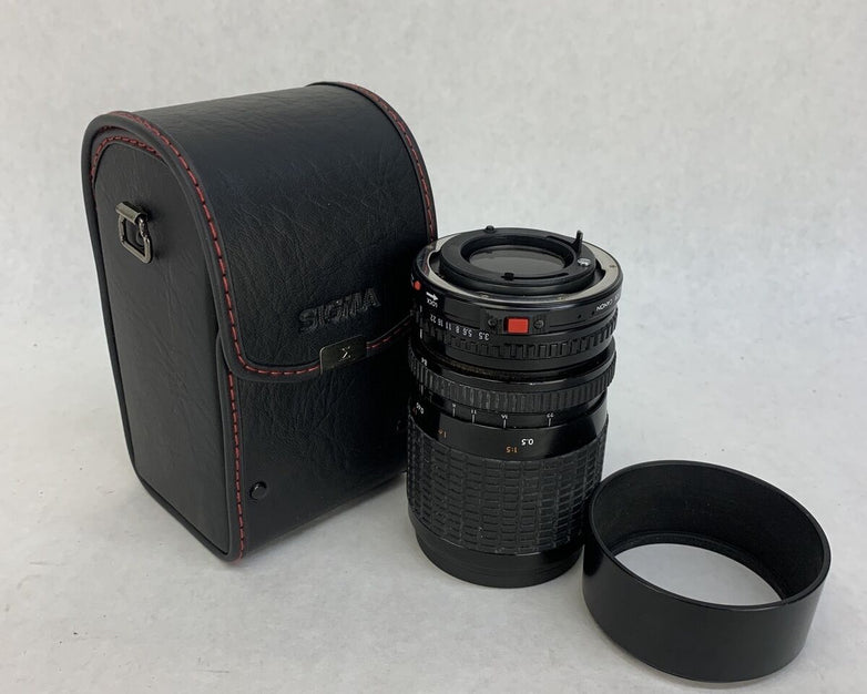 Sigma Zoom III Lens 1: 3.5- 4.5, 28 - 84 mm For Canon w/Hoya UV[0] Filter