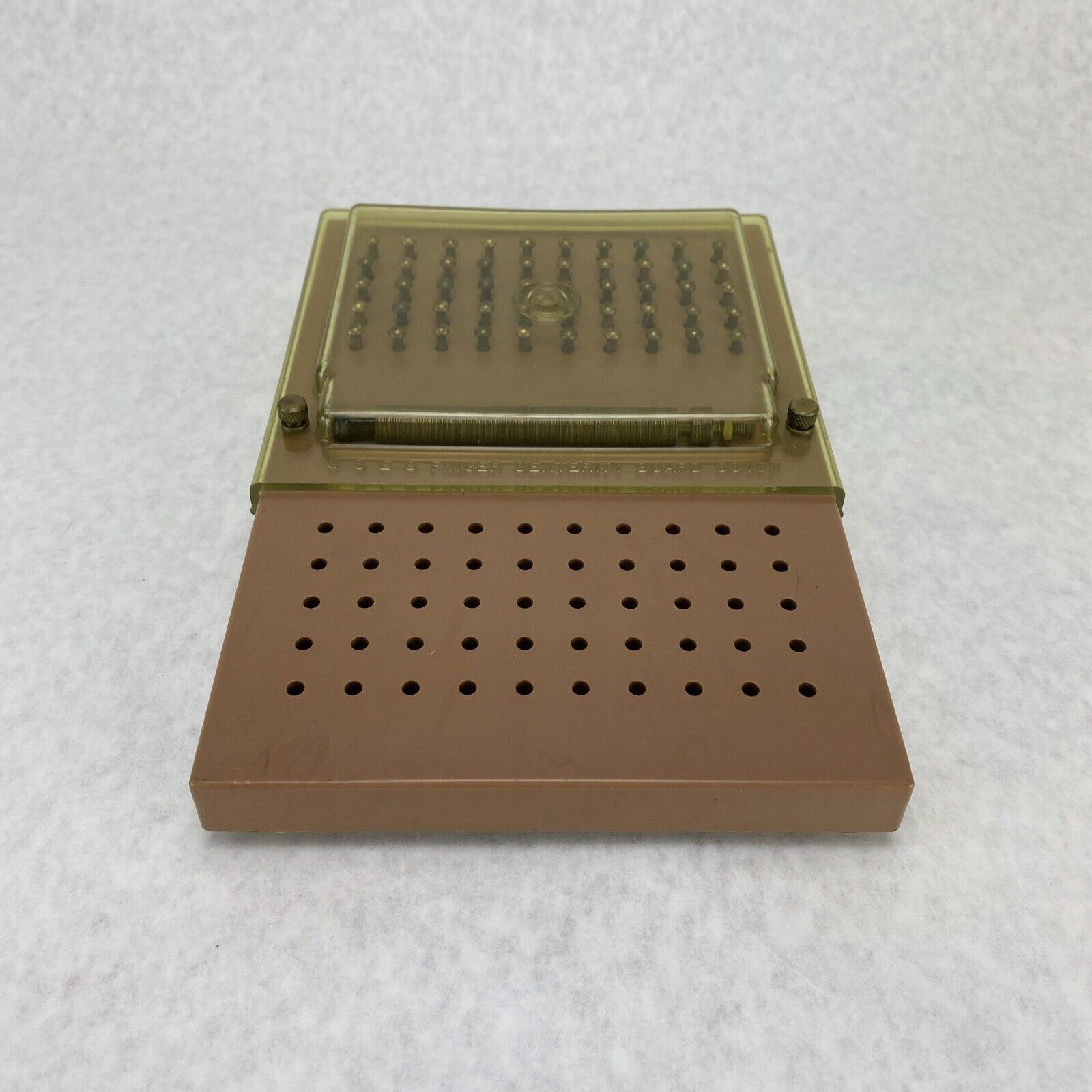 Vintage USES Finger Dexterity Board Beige Tint Cover