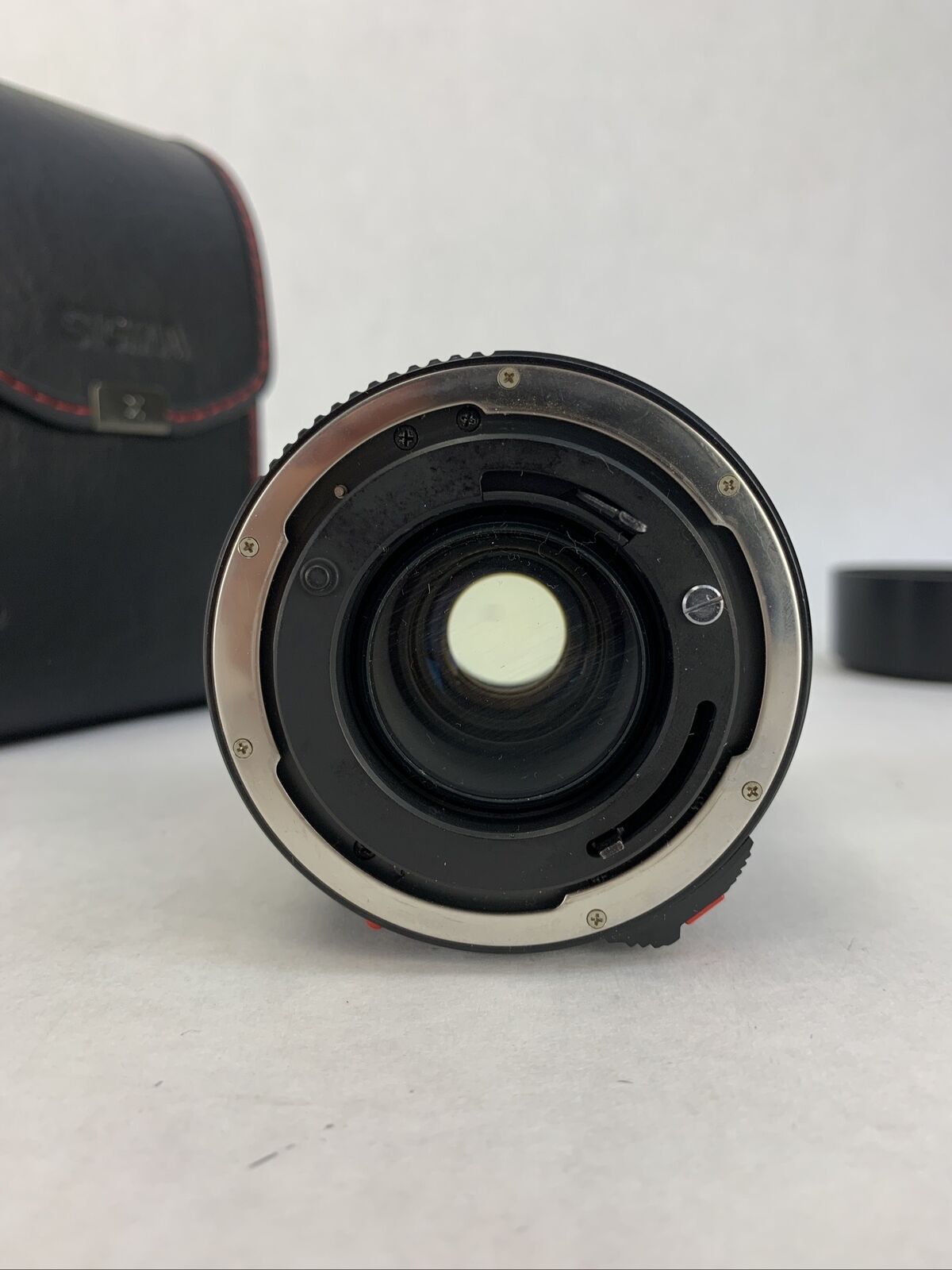 Sigma Zoom III Lens 1: 3.5- 4.5, 28 - 84 mm For Canon w/Hoya UV[0] Filter