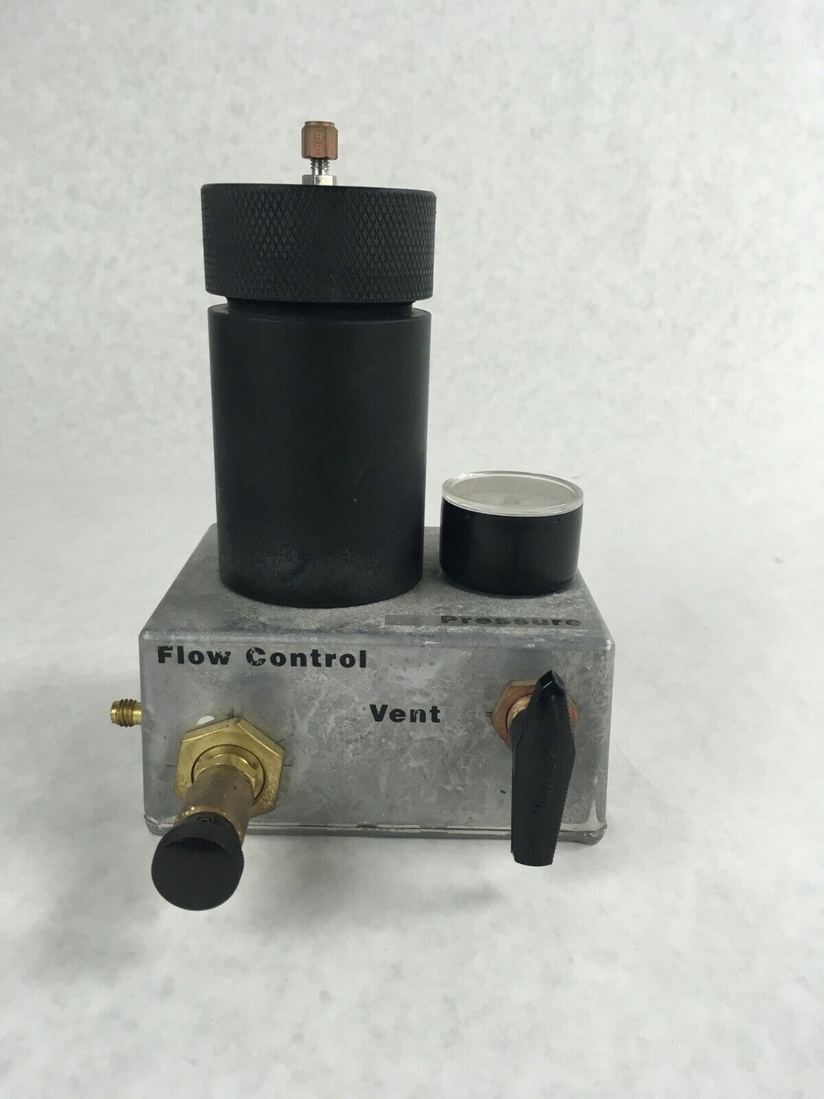 Pressure Compensated Flow Control Valve Vent With Container Vial