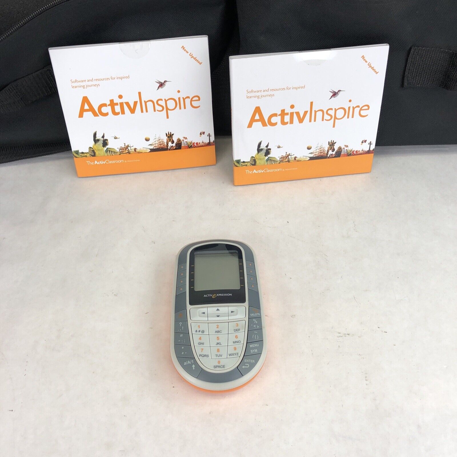 2 Sets of 33 Promethean ActivExpression PRM-AE1-01 Remotes With Carrying Cases