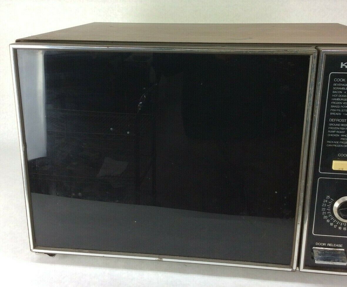 MICROWAVE BY GENERAL ELECTRIC. VINTAGE 1979 RUNS SMOOTH AND QUIET