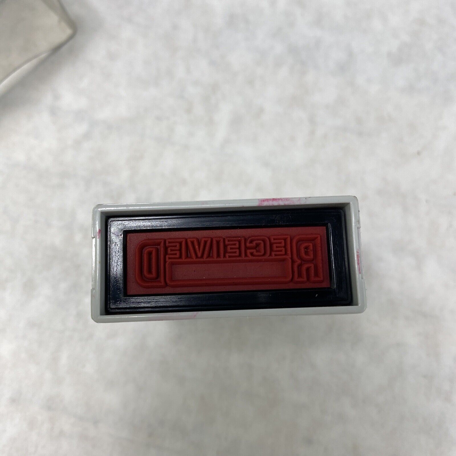 Offistamp Pre-Inked Stamp 1.5" x 3/8" RECEIVED in red ink  USED