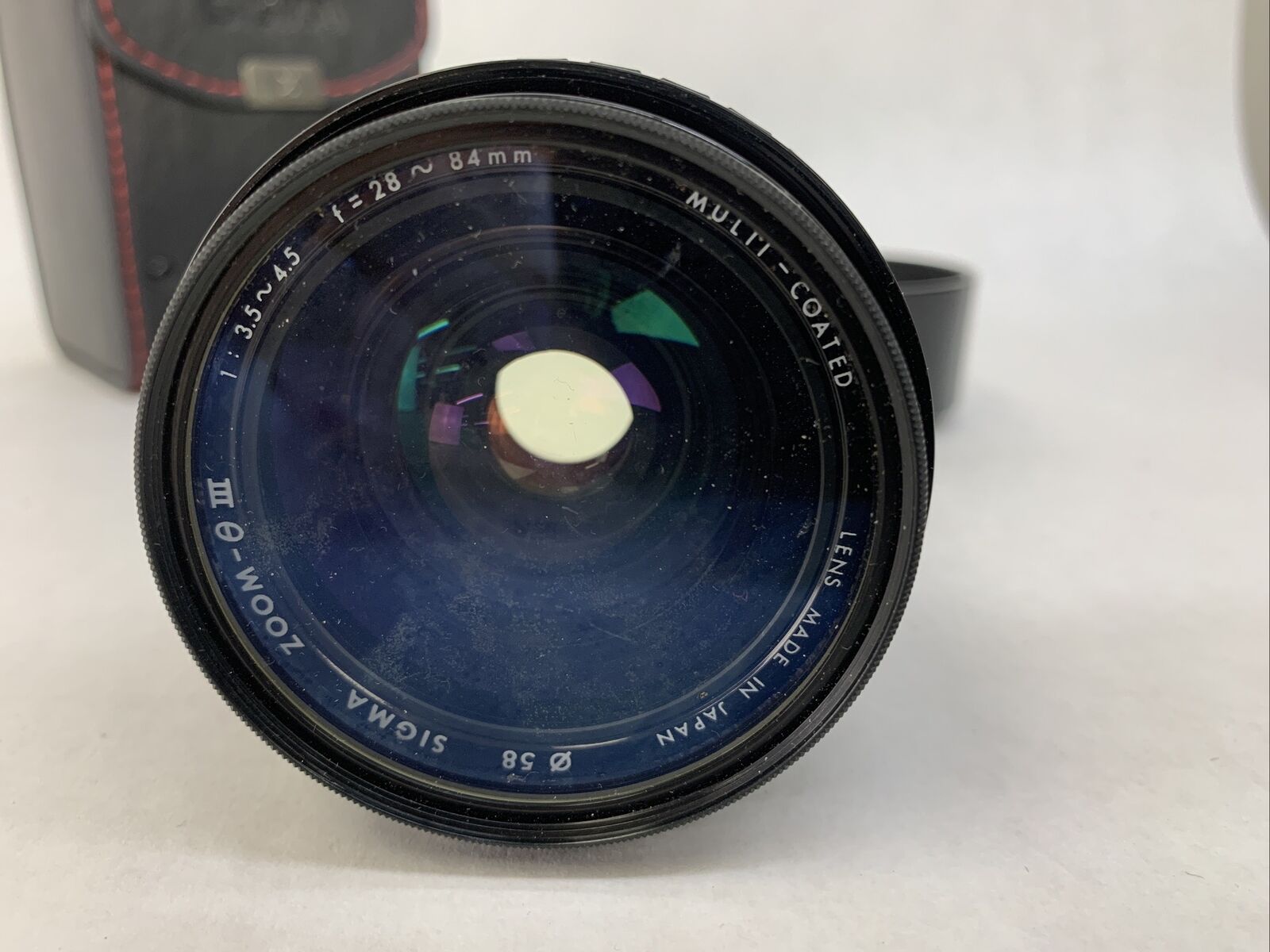 Sigma Zoom III Lens 1: 3.5- 4.5, 28 - 84 mm For Canon w/Hoya UV[0] Filter